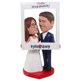 Custom Wedding Bobblehead holding photo frame