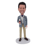 Custom bobblehead holding wine bottle 