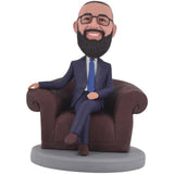 Custom bobblehead the best boss sitting on a sofa