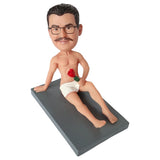 Customized Naked Bobblehead lying with rose and towel
