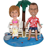Bobbleheads Couple Relaxing on Beach