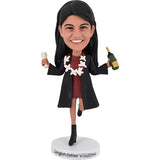 Graduation Bobbleheads with champagne